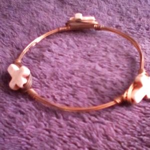 Bracelet Gold Color Metal 4 or 5 metal strands braided with 3white color crosses